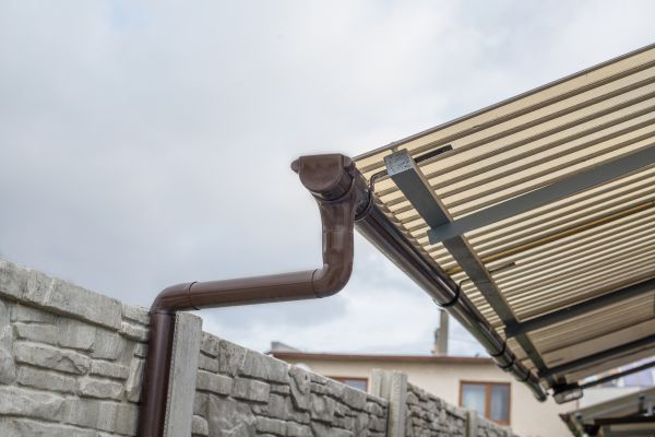 Plastic Downspout Installation in Clayton